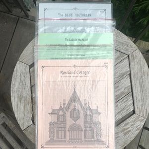 A collection of 3 cross stitch patterns of Victorian mansions from Eureka, CA